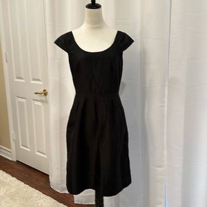 darling party dress, fully lined with pleats, and cap sleeves